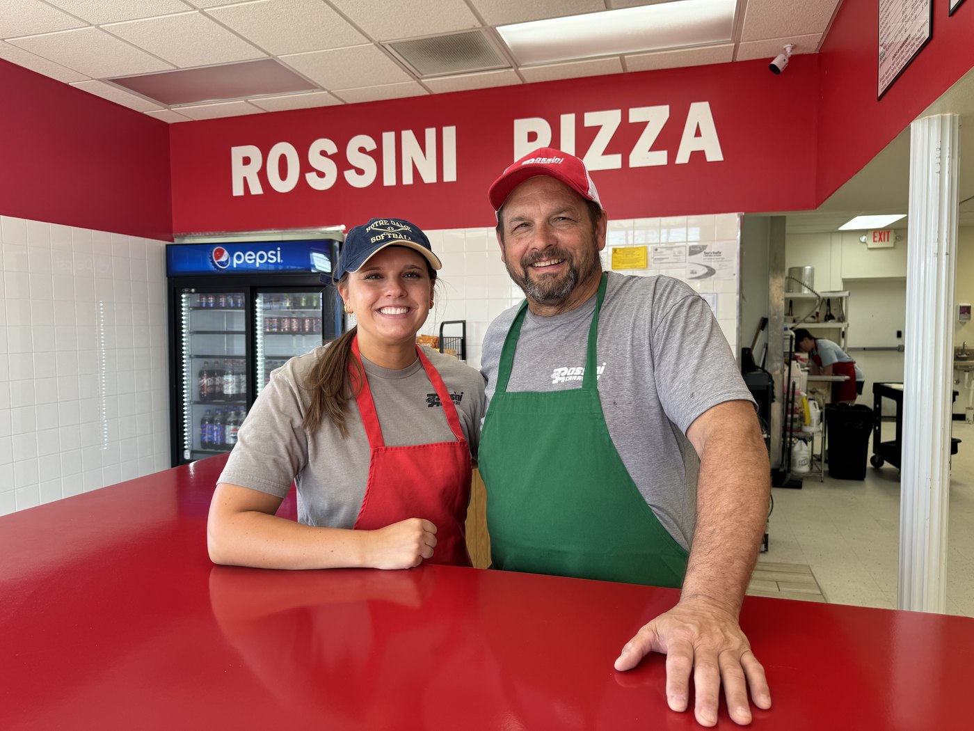 Rossini owner and daughter behind the counter